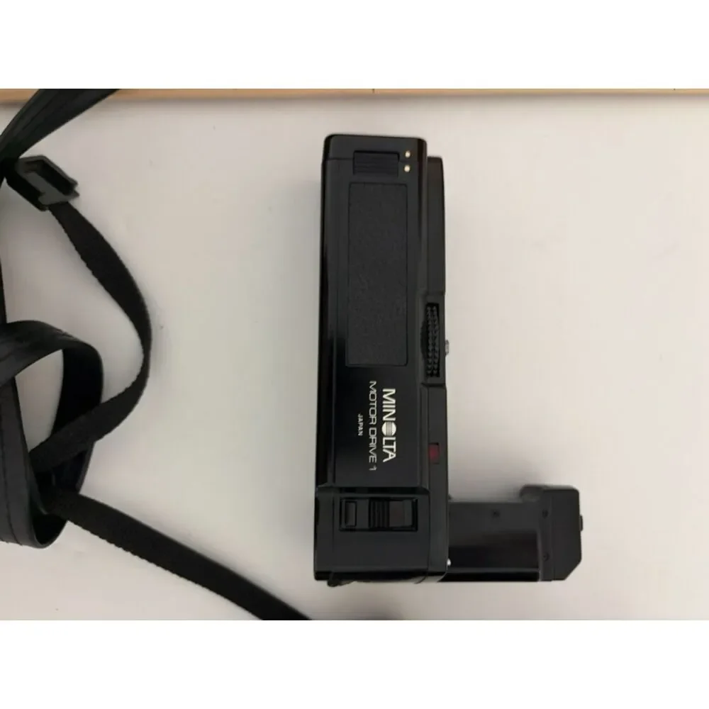 Minolta X-700 with accessories and carry case.
